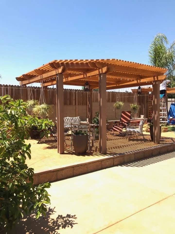 Finished cedar pergola with seating area