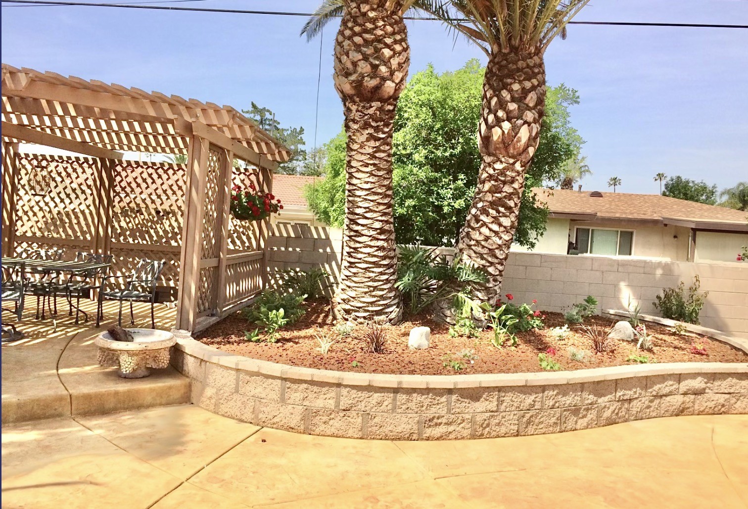 Finished Fontana backyard with pergola and landscaping