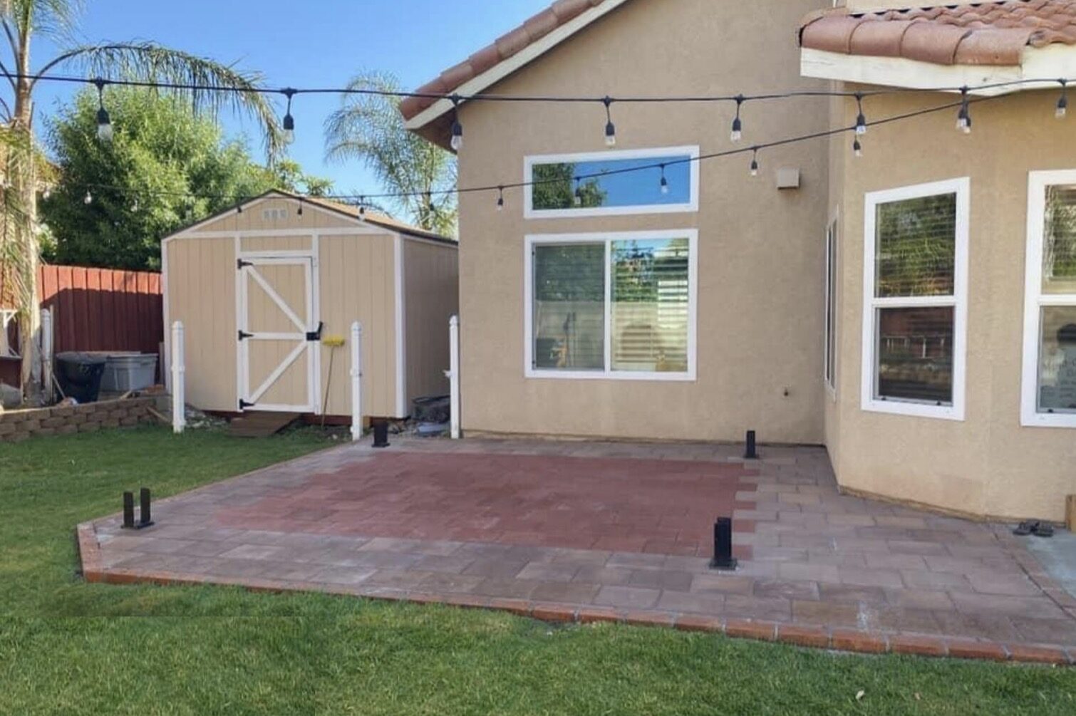 Two-tone paver patio installation